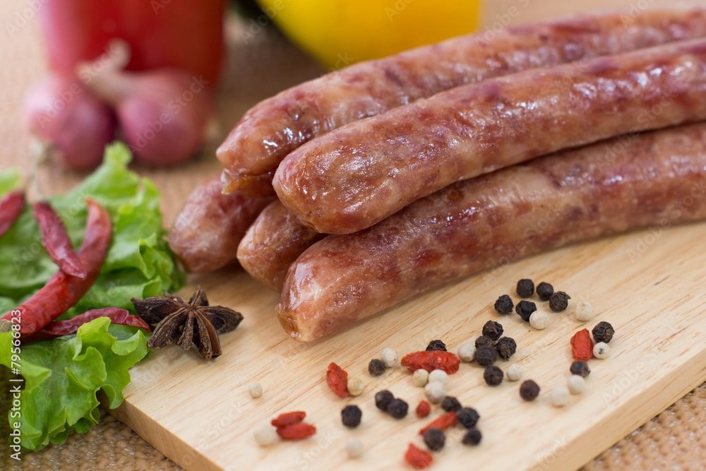 chinese-sausages-on-chopping-block-stockpack-adobe-stock chinese sausages on chopping block