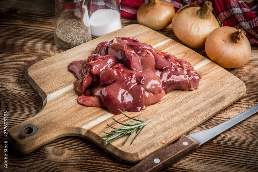 raw-chicken-liver-on-cutting-board-stockpack-adobe-stock Raw chicken liver on cutting board.