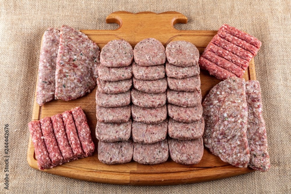 turkish-uncooked-meatballs-kofte-or-kofta-made-with-minced-meat-on-wooden-surface-different-kinds-of-turkish-traditional-meal-kofte-on-a-light-cutting-stockpack-adobe-stock Turkish uncooked Meatballs Kofte or Kofta made with Minced Meat on Wooden Surface. Different kinds of turkish traditional meal Kofte on a light cutting.